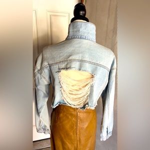 Distressed denim jacket